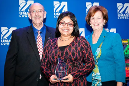 Dr. Urmitapa Dutta receives the 2015 MLK Distinguished Service Award from Associate Vice Chancellor Larry Siegel (left) and then-Executive Vice Chancellor Jacquie Moloney (right).